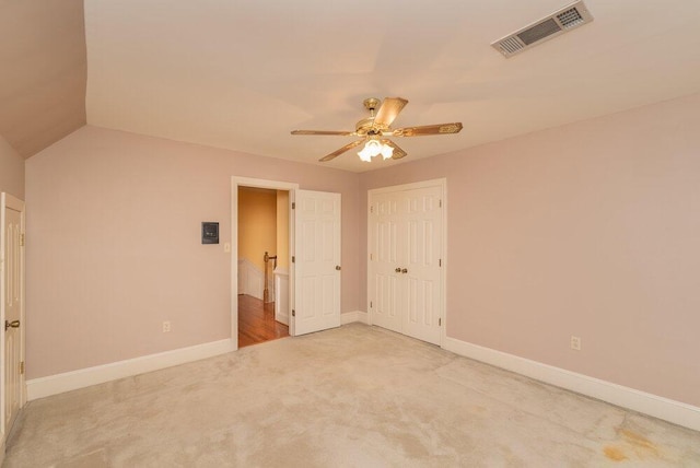 3287 Surrey Rd, Thomson, GA 30824 - unfurnished bedroom with carpet, a ceiling fan, baseboards, visible vents, and a closet