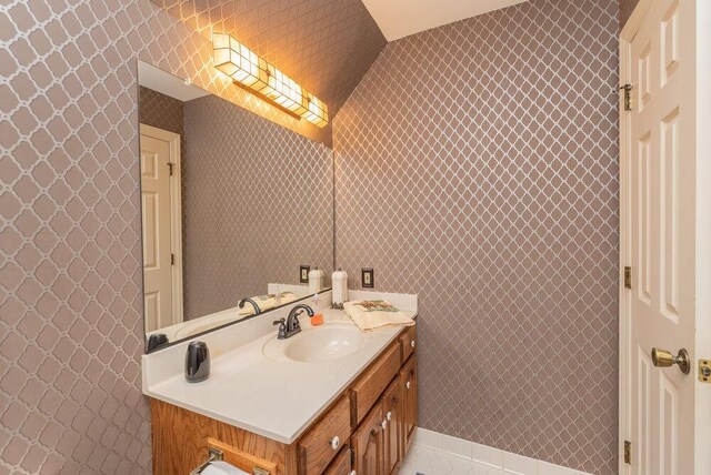 3287 Surrey Rd, Thomson, GA 30824 - bathroom featuring tile patterned flooring, vanity, and wallpapered walls