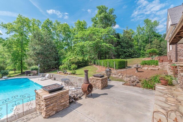 3287 Surrey Rd, Thomson, GA 30824 - outdoor pool with a patio area