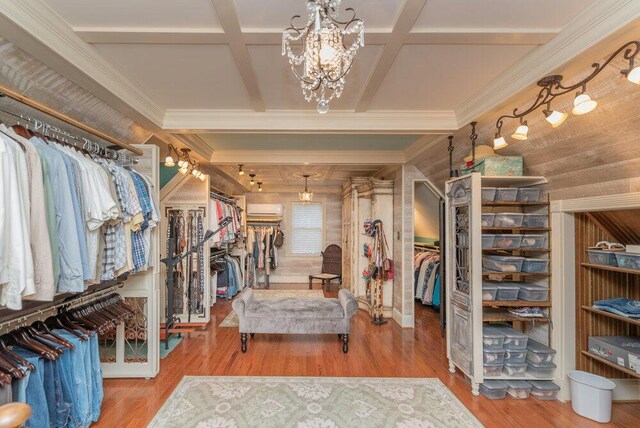3287 Surrey Rd, Thomson, GA 30824 - walk in closet featuring an AC wall unit, coffered ceiling, wood finished floors, and a chandelier