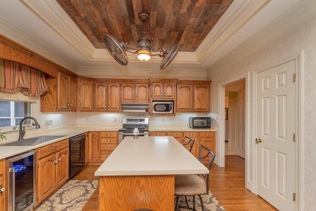3287 Surrey Rd, Thomson, GA 30824 - kitchen featuring ornamental molding, beverage cooler, a raised ceiling, a sink, and appliances with stainless steel finishes