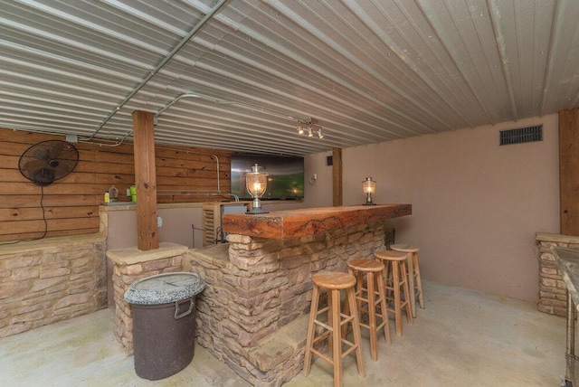3287 Surrey Rd, Thomson, GA 30824 - bar with concrete floors, wet bar, and visible vents
