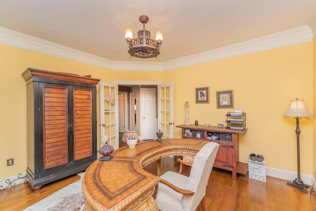 3287 Surrey Rd, Thomson, GA 30824 - dining area featuring crown molding, wood finished floors, and a notable chandelier