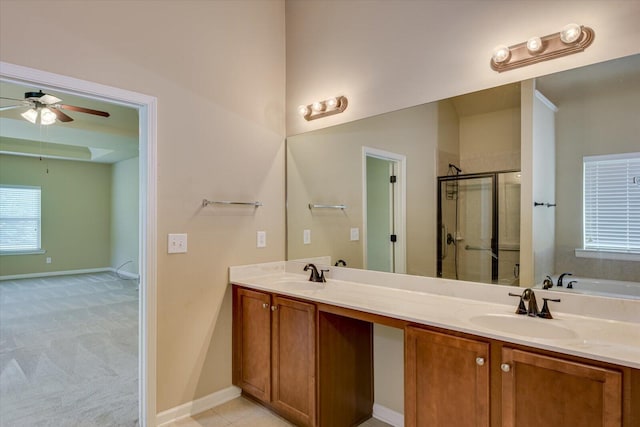 bathroom featuring vanity, separate shower and tub, and ceiling fan