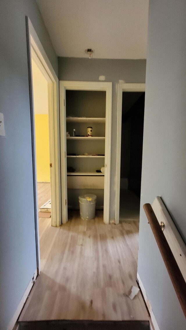 hallway featuring light hardwood / wood-style flooring