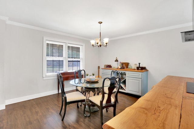 2530 Springwood Dr, Augusta, GA 30904 - dining space with baseboards, ornamental molding, a chandelier, and dark wood-style floors