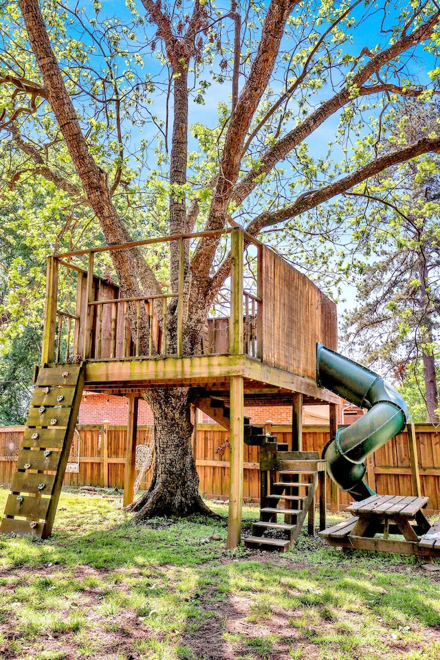 2530 Springwood Dr, Augusta, GA 30904 - view of play area featuring a wooden deck, a yard, stairway, and fence
