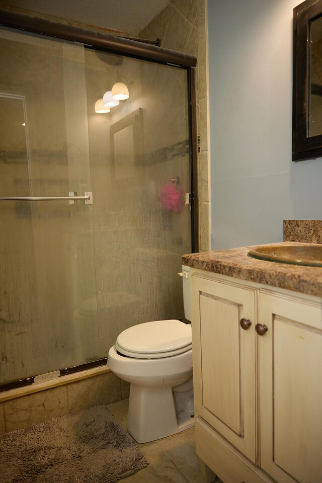 2530 Springwood Dr, Augusta, GA 30904 - full bathroom featuring toilet, vanity, and a stall shower