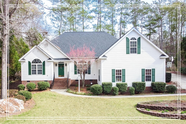 view of front facade with roof with shingles, a front lawn, and crawl space