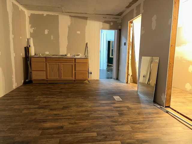 interior space with dark wood-type flooring