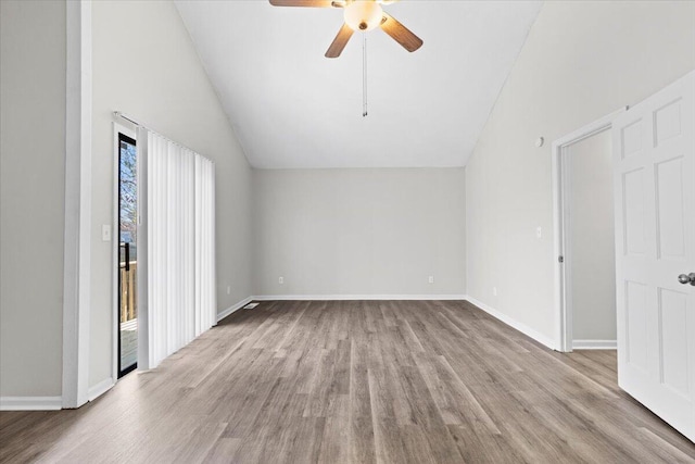 interior space featuring high vaulted ceiling, light wood-type flooring, and ceiling fan