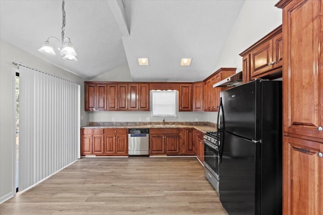 kitchen featuring sink, light hardwood / wood-style floors, a chandelier, pendant lighting, and appliances with stainless steel finishes