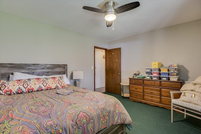 bedroom featuring carpet and a ceiling fan