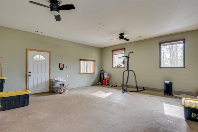 garage featuring visible vents and a ceiling fan