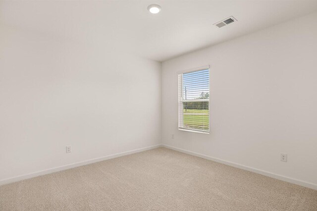 unfurnished room with carpet