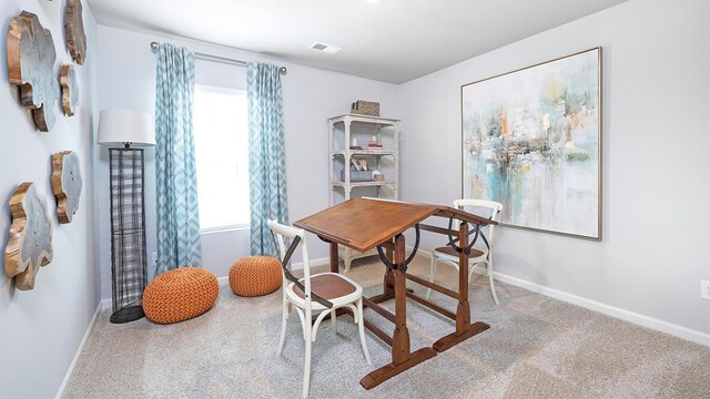 dining area with carpet