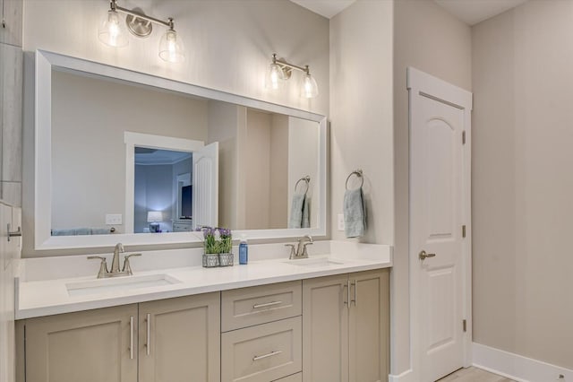 248 Amelia Dr, Mccormick, SC 29835 - full bath with double vanity, baseboards, and a sink