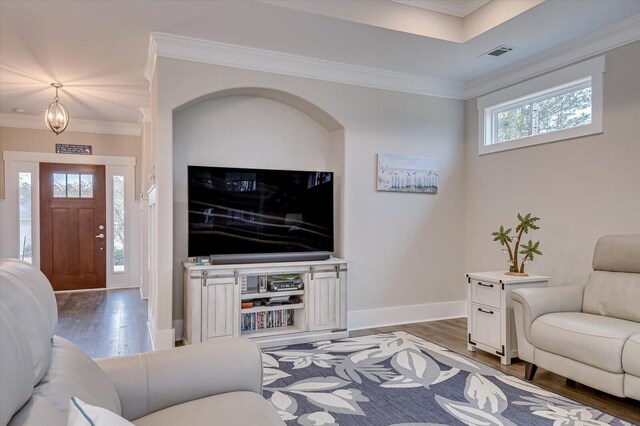 248 Amelia Dr, Mccormick, SC 29835 - living area with wood finished floors, baseboards, ornamental molding, and visible vents
