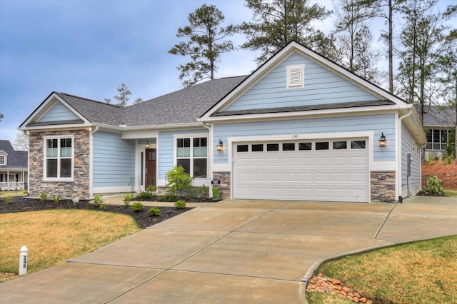 248 Amelia Dr, Mccormick, SC 29835 - craftsman house with a garage, roof with shingles, a front yard, stone siding, and driveway