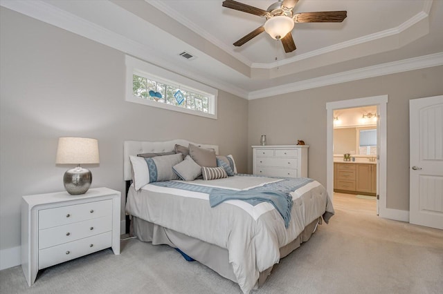 248 Amelia Dr, Mccormick, SC 29835 - bedroom featuring visible vents, crown molding, a tray ceiling, ensuite bath, and light colored carpet