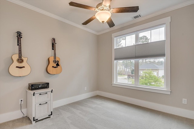 248 Amelia Dr, Mccormick, SC 29835 - empty room with visible vents, baseboards, ornamental molding, a ceiling fan, and light carpet