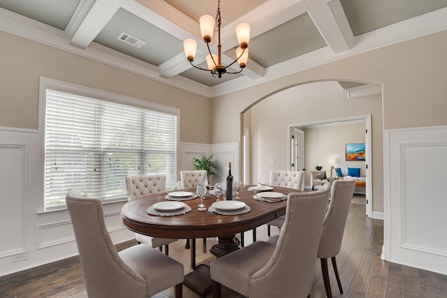 5410 Victoria Fls, Grovetown, GA 30813 - dining room featuring arched walkways, coffered ceiling, a decorative wall, a chandelier, and beamed ceiling