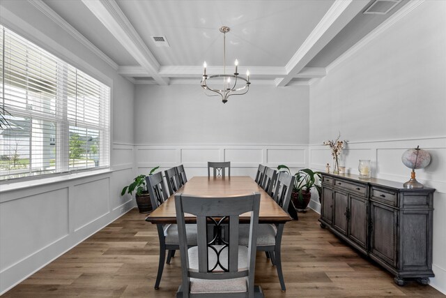 3540 Hilltop Trl, Evans, GA 30809 - dining space with a chandelier, a decorative wall, wood finished floors, crown molding, and wainscoting