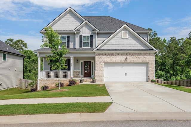 3540 Hilltop Trl, Evans, GA 30809 - craftsman house with a porch, concrete driveway, brick siding, a shingled roof, and a garage