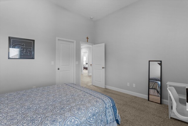 3540 Hilltop Trl, Evans, GA 30809 - carpeted bedroom with a towering ceiling and baseboards