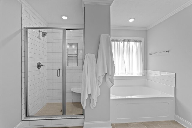 3540 Hilltop Trl, Evans, GA 30809 - bathroom featuring baseboards, a bath, ornamental molding, a stall shower, and tile patterned floors