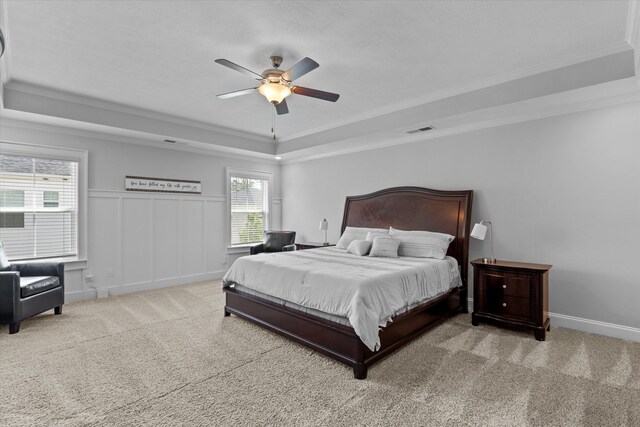 3540 Hilltop Trl, Evans, GA 30809 - carpeted bedroom with a tray ceiling, crown molding, and a ceiling fan