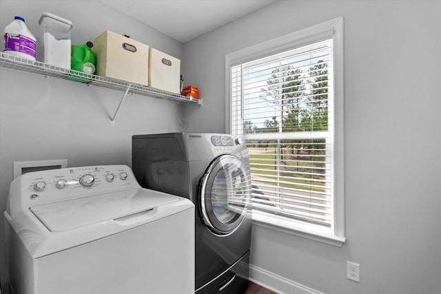 3540 Hilltop Trl, Evans, GA 30809 - laundry room with separate washer and dryer and baseboards