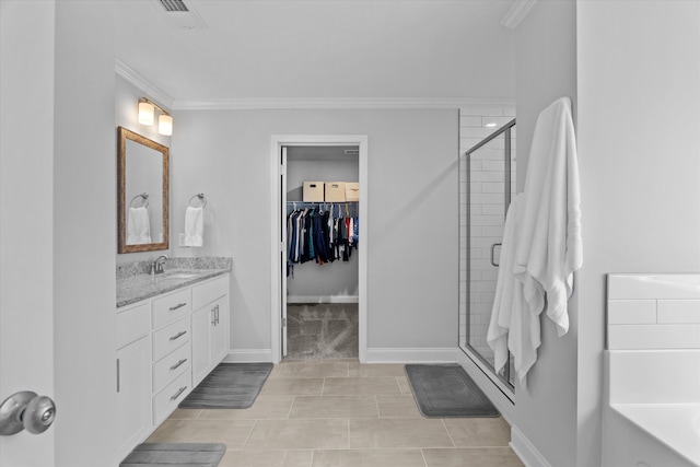 3540 Hilltop Trl, Evans, GA 30809 - full bath with vanity, a stall shower, ornamental molding, a bath, and baseboards