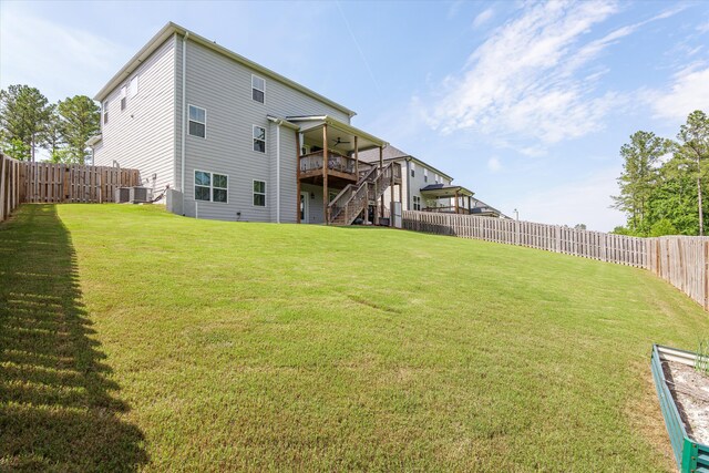 3540 Hilltop Trl, Evans, GA 30809 - back of house with stairway, ceiling fan, a deck, and central AC
