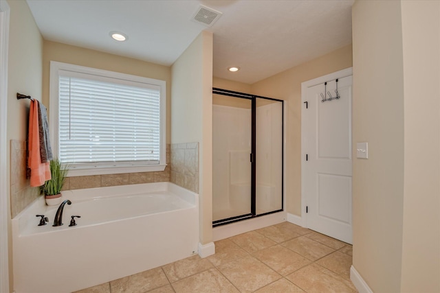 full bath with a bath, a stall shower, tile patterned floors, recessed lighting, and baseboards