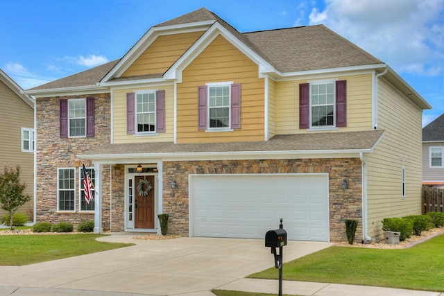 view of front of property with driveway, stone siding, a front lawn, an attached garage, and roof with shingles
