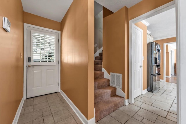 3974 Bolton St, Augusta, GA 30909 - doorway to outside with baseboards, stairs, and ornamental molding
