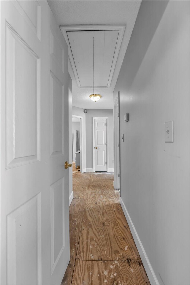 3974 Bolton St, Augusta, GA 30909 - corridor with attic access and baseboards