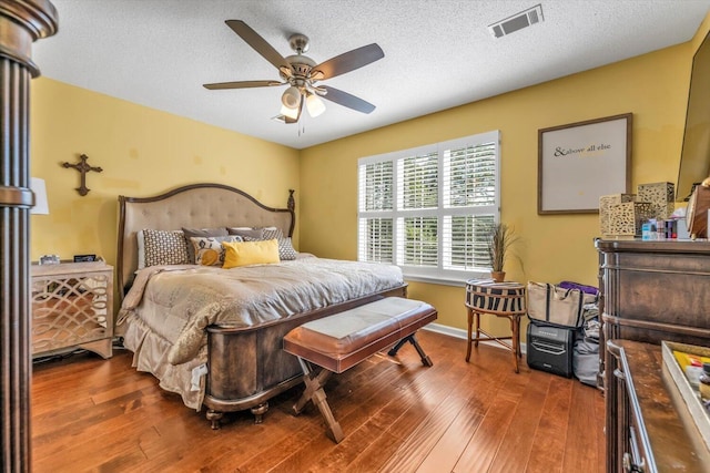 3974 Bolton St, Augusta, GA 30909 - bedroom featuring hardwood / wood-style flooring, ceiling fan, baseboards, and a textured ceiling