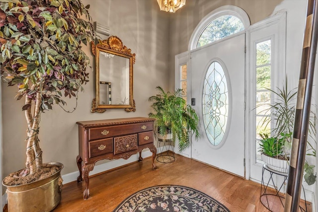 3974 Bolton St, Augusta, GA 30909 - foyer with wood finished floors, a towering ceiling, and a chandelier