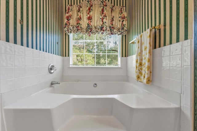 3974 Bolton St, Augusta, GA 30909 - bathroom featuring wallpapered walls, a bath, and a wainscoted wall