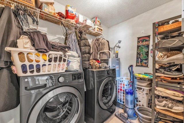 3974 Bolton St, Augusta, GA 30909 - laundry area featuring washing machine and clothes dryer and a textured ceiling