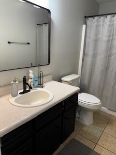 4512 Country Glen Cir, Grovetown, GA 30813 - bathroom with vanity, tile patterned floors, and a shower with shower curtain