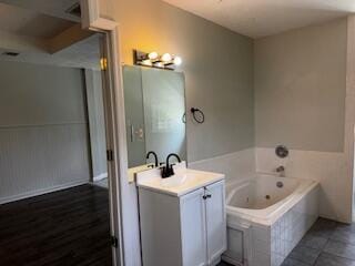 4512 Country Glen Cir, Grovetown, GA 30813 - bathroom with vanity, a whirlpool tub, and tile patterned floors