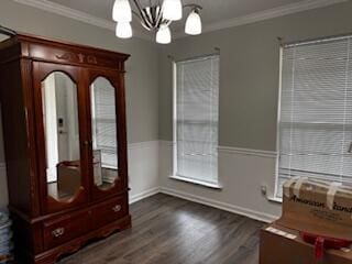 4512 Country Glen Cir, Grovetown, GA 30813 - unfurnished dining area with a chandelier, dark wood-type flooring, ornamental molding, and french doors
