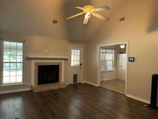 4512 Country Glen Cir, Grovetown, GA 30813 - unfurnished living room featuring a fireplace with raised hearth, wood finished floors, ceiling fan, and high vaulted ceiling