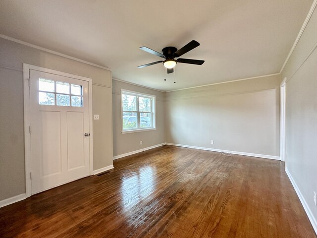 entrance foyer with crown molding, ceiling fan, and dark hardwood / wood-style floors