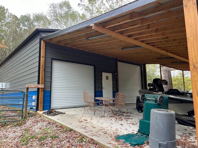 exterior space with a carport