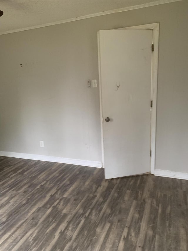 1978 Greene St, Augusta, GA 30904 - unfurnished room featuring dark wood-style floors, baseboards, and ornamental molding
