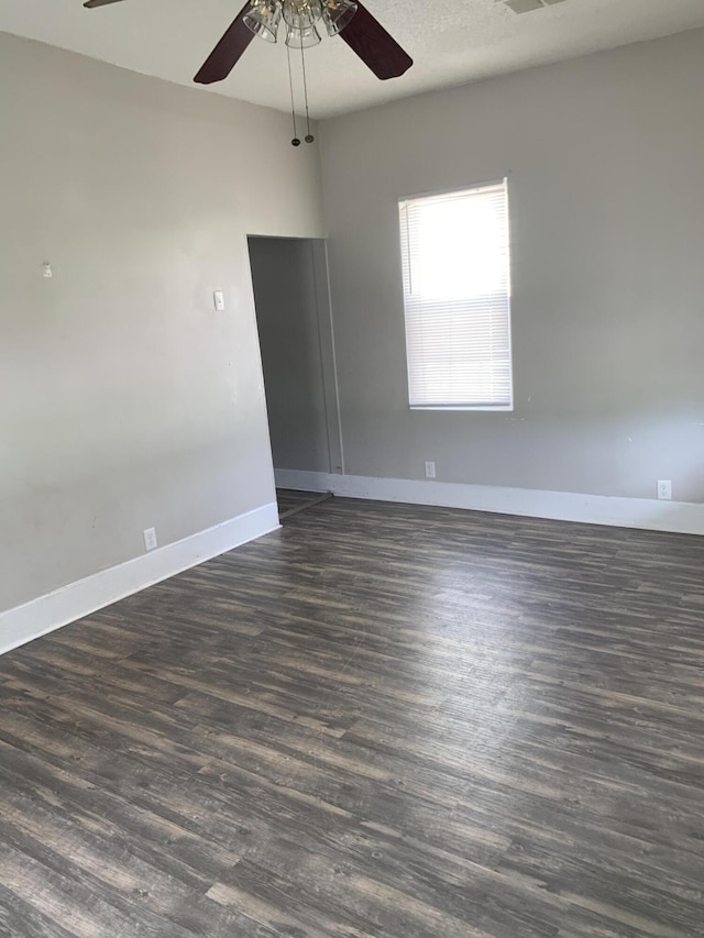 1978 Greene St, Augusta, GA 30904 - unfurnished room featuring dark wood-style flooring, visible vents, baseboards, and a ceiling fan